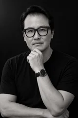 Black-and-white portrait of Sung Won, MD in a black shirt